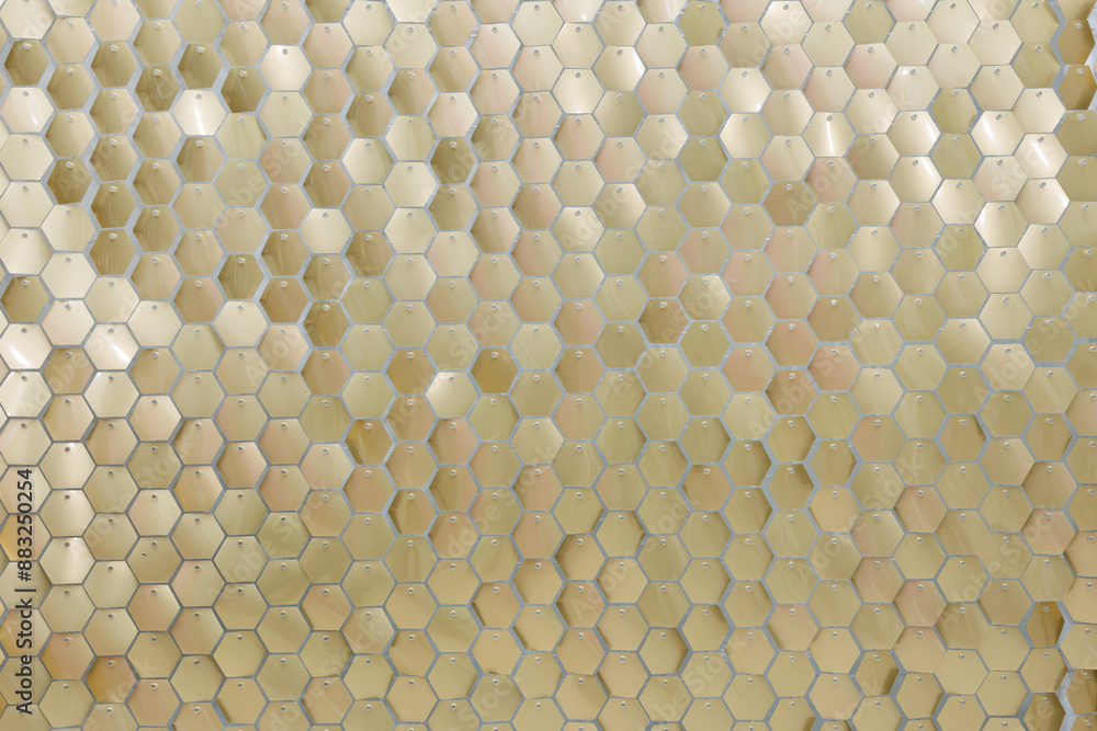 Shiny gold sequins close-up. A photo zone made of sequins. Shiny gold sequins close-up. A photo zone made of sequins.
