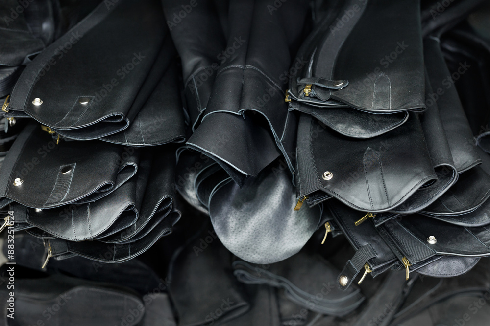 Obraz premium Leather riding boots at the factory. Handmade work.