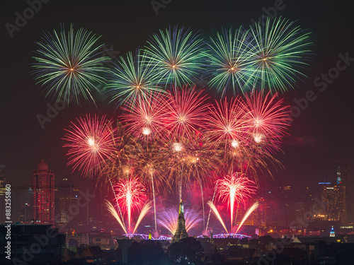 Wat Arun Ratchawararam (the Temple of Dawn) with Beautiful Fireworks new year celebration, Bangkok, Thailand photo