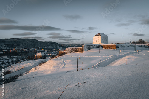 Kristiansten Festning old fortress on the hills in Trondheim, Norway. View on the Fortress. Beautiful winter scenery. photo