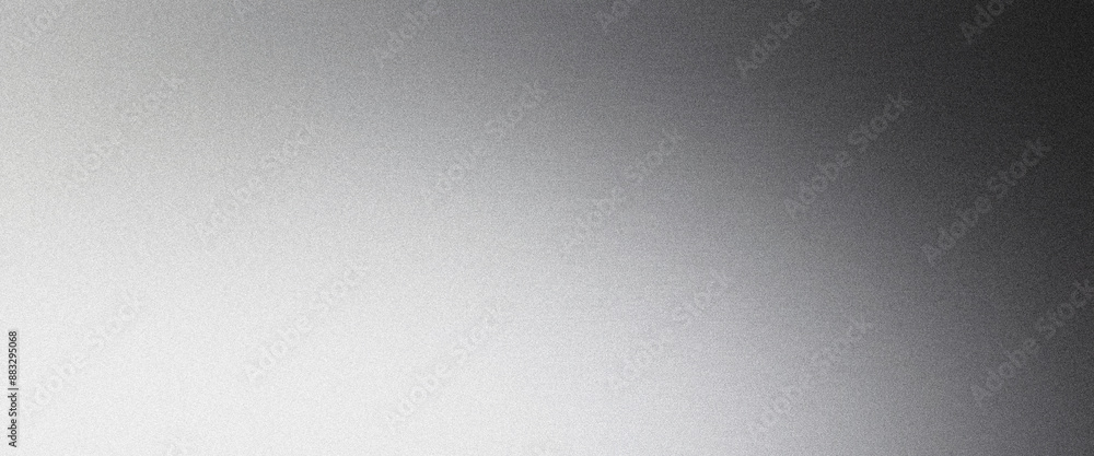 Abstract silver background with fine grain texture fading to black, great for design projects Abstract silver background with fine grain texture fading to black, great for design projects