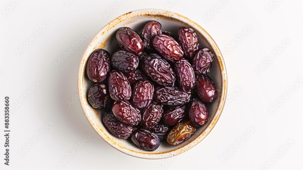 Bowl of pitted dates isolated on white background, top view
Bowl of pitted dates isolated on white background, top view