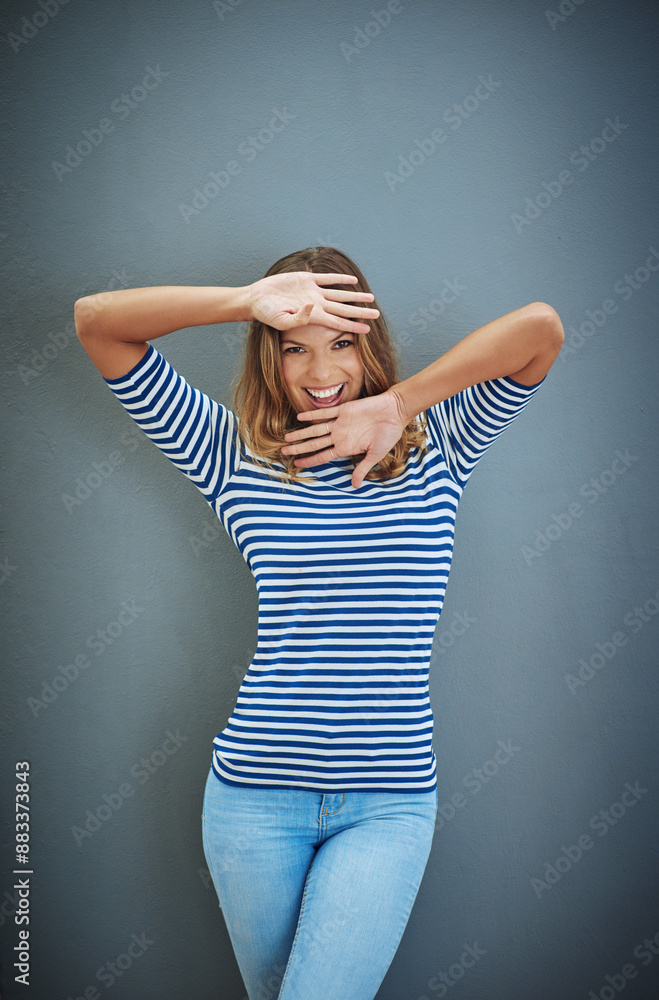 Girl, happy and portrait in studio backdrop for fashion with joy for confidence, trendy or style. Female person, outfit and fun in isolated, excited and hand gesture for aesthetic in gray background Girl, happy and portrait in studio backdrop for fashion with joy for confidence, trendy or style. Female person, outfit and fun in isolated, excited and hand gesture for aesthetic in gray background