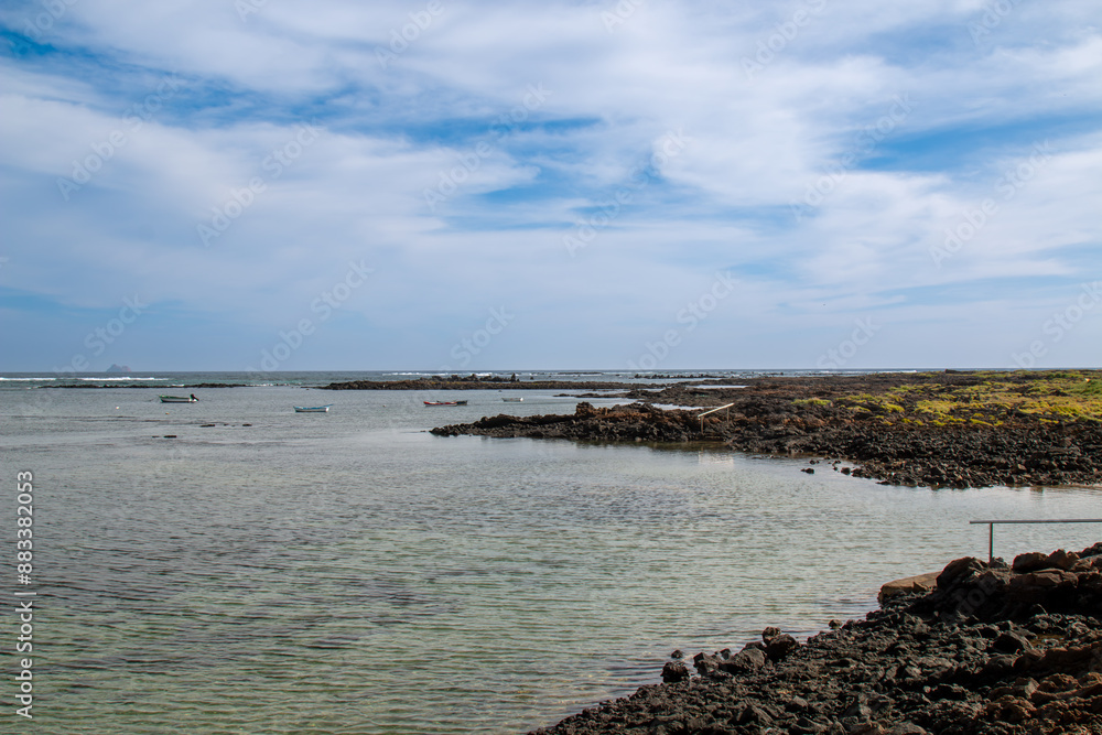 Shallow Atlantic ocean water in Caleton Blanco, Lanzarote Shallow Atlantic ocean water in Caleton Blanco, Lanzarote