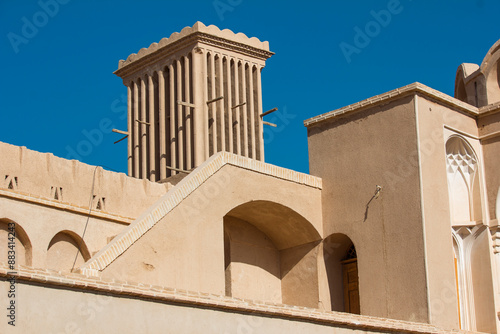  The wind catcher or ventilation tower made with adobes, a genius way to cool down the heat of hot summers with power of nature in the historical mansion of Aghazadeh in Abarkuh, Yazd, Iran.