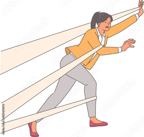 Business woman is trying to get rid of chaotic shackles that fetter body and prevent from moving forward. Successful girl advances in career despite problems and shackles that complicate task