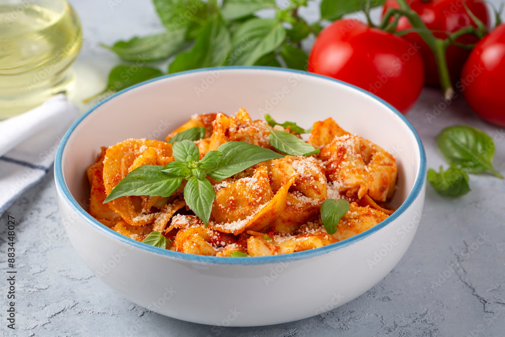 Italian tortellini pasta with tomato sauce - Italian food style Italian tortellini pasta with tomato sauce - Italian food style
