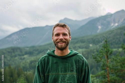 A highland summer forest portrait of a young man.