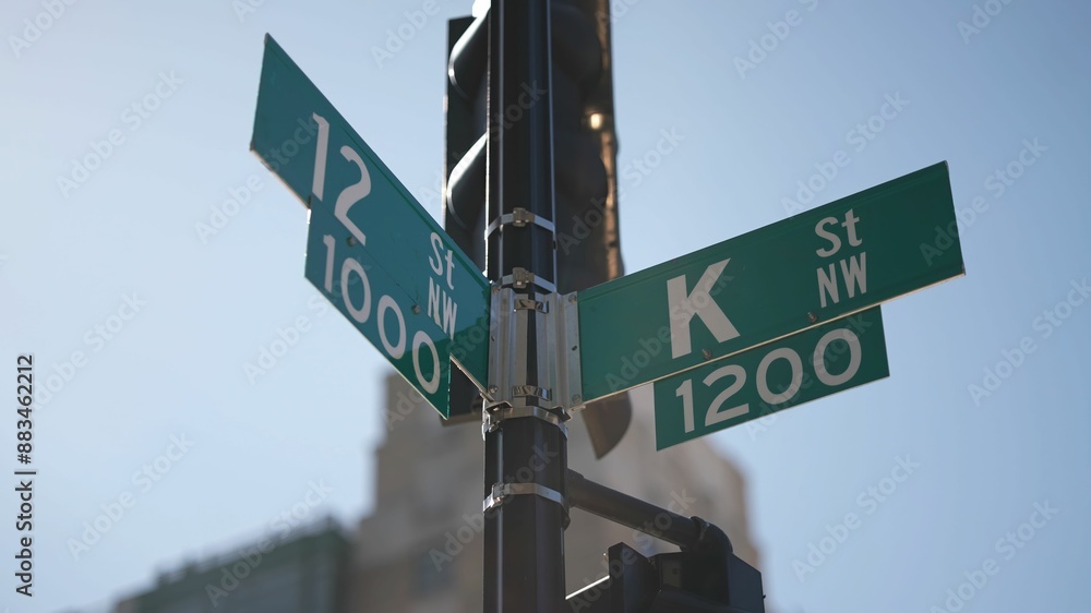 Fototapeta premium K street nw and 12th street nw street signs in downtown Washington DC symbolizing lobbying and corruption in nations capital