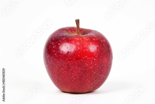 A fresh, red apple sits on a light surface against a muted, textured background. Perfect for food and health-related concepts.. Beautiful simple AI generated image in 4K, unique. © ArtSpree