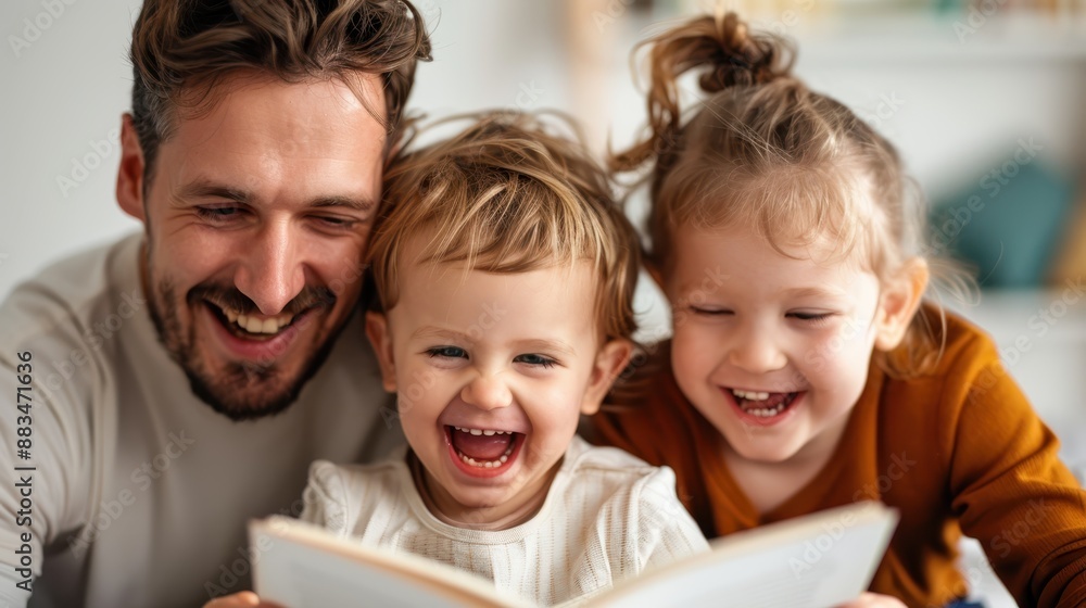 A father reads a book to his smiling young children, capturing a moment of shared joy, learning, and familial bonding within the cozy comfort of their home. A father reads a book to his smiling young children, capturing a moment of shared joy, learning, and familial bonding within the cozy comfort of their home.