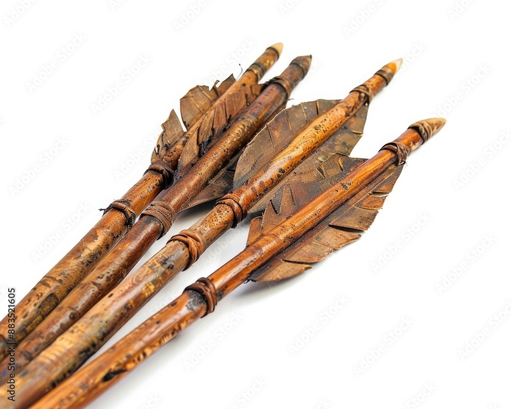 Fototapeta premium Native Arrow. Handmade American Indian Arrow Replicas with Arrowheads on White Background