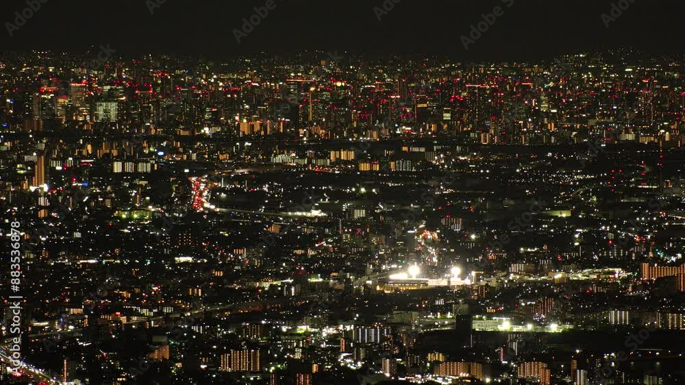 OSAKA, JAPAN - JUNE 2024 : Aerial high angle view of Osaka city at night. View of buildings and street around Osaka station, Shinsaibashi and Namba downtown area. OSAKA, JAPAN - JUNE 2024 : Aerial high angle view of Osaka city at night. View of buildings and street around Osaka station, Shinsaibashi and Namba downtown area.