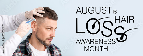 Man with hair loss problem receiving injection on color background