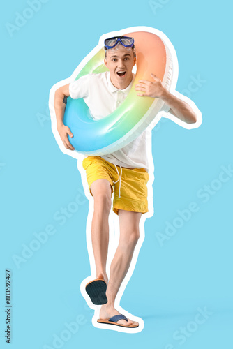 Young man with snorkeling m...