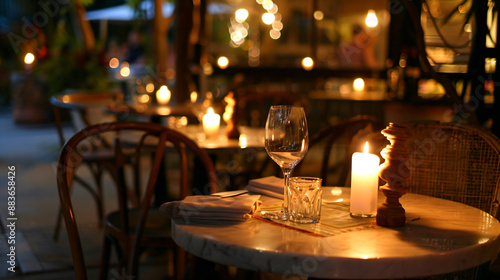 Romantic Dinner Table Setting with Candles and Wine Glass.