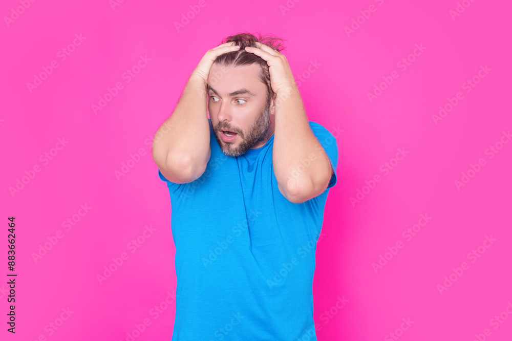 Emotional scared man looks with frightened expression, nervously, demonstrates phobia. Human reaction and emotions. Oops. Close up of sad terrified man horrified facial expression. Emotional scared man looks with frightened expression, nervously, demonstrates phobia. Human reaction and emotions. Oops. Close up of sad terrified man horrified facial expression.