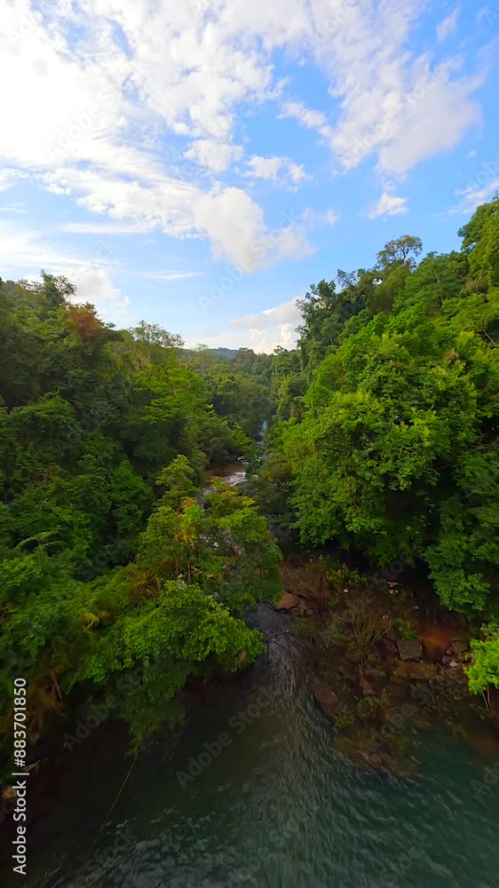 Smooth FPV flight over tropical river in the lush jungle, Thailand Smooth FPV flight over tropical river in the lush jungle, Thailand