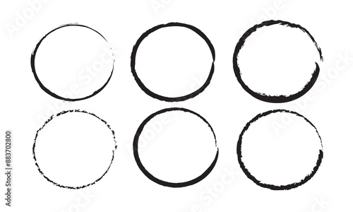 Grunge circles brush set. Black circle frames. Round line of black paint. Grunge round shapes. Circular ink brush stroke fro design elements. Vector illustration.
