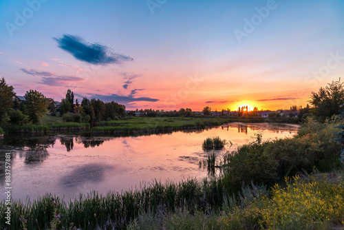 Sunset View Over Pond in Summer in Blackfalds, Alberta