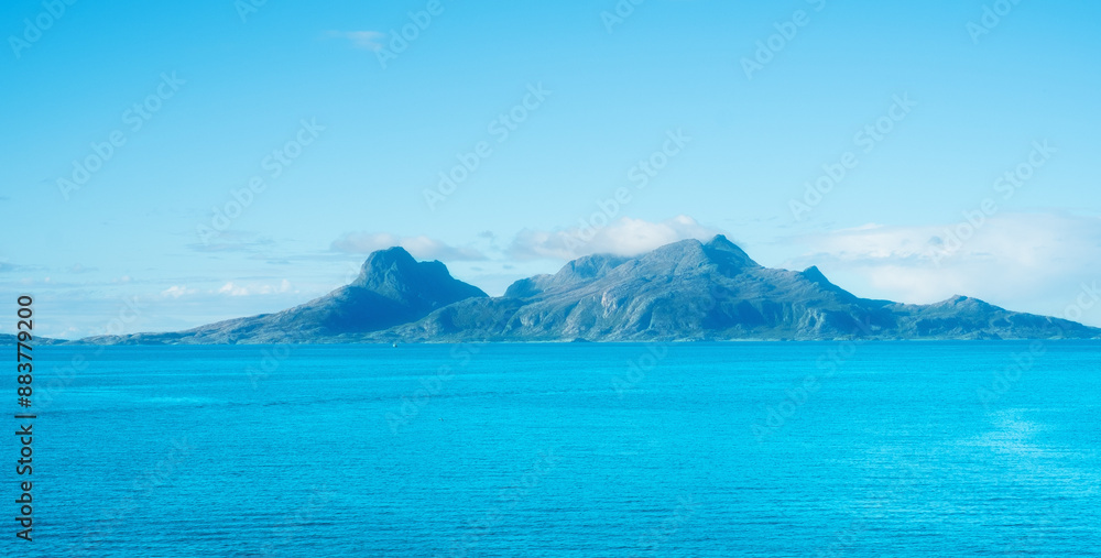 Naklejka premium North, water or landscape of mountains with natural environment or arctic circle in Norway. Zen lake, calm peace or scenic view of Europe in remote area for outdoor travel, holiday and vacation break