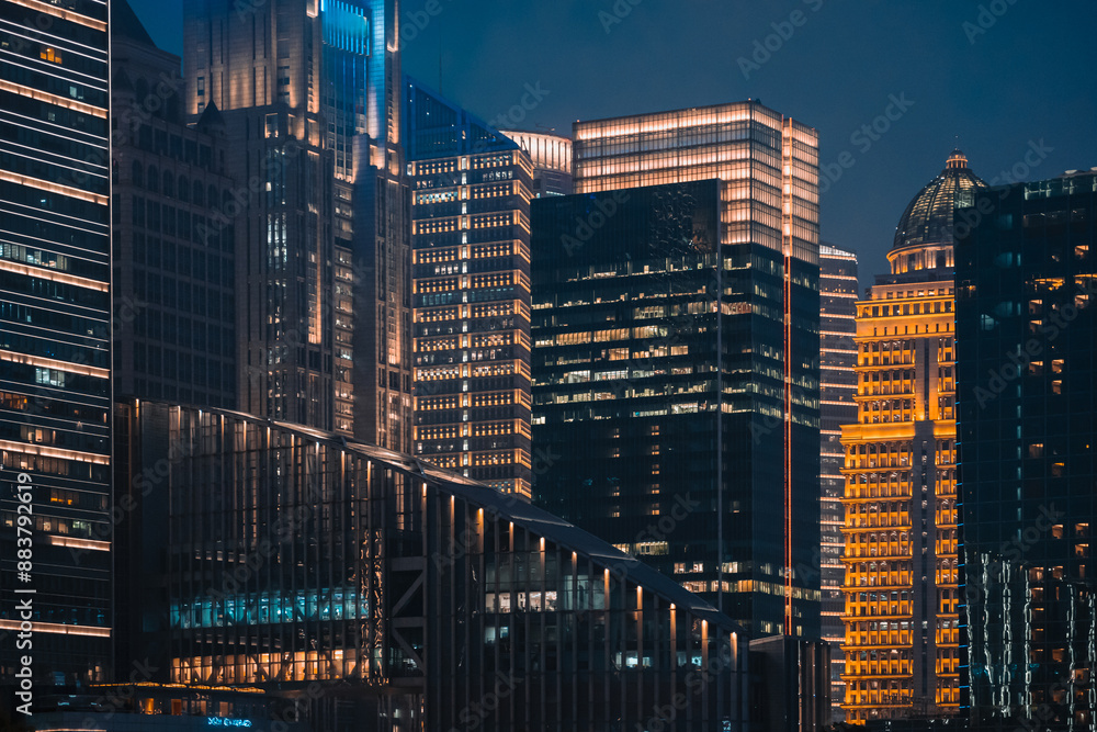 Obraz premium Urban skyscrapers in Shanghai at night; 