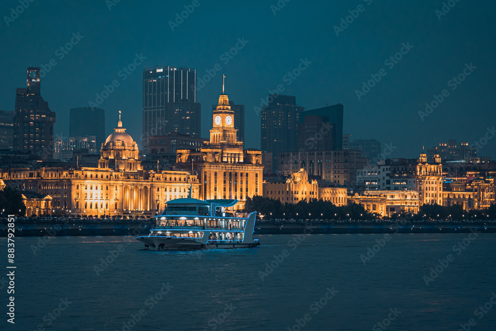 Obraz premium Urban skyscrapers in Shanghai at night; 