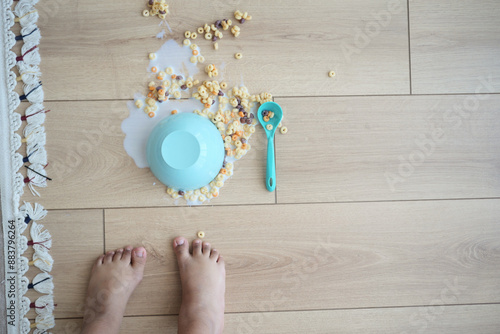 Spilled breakfast cereal on floor photo