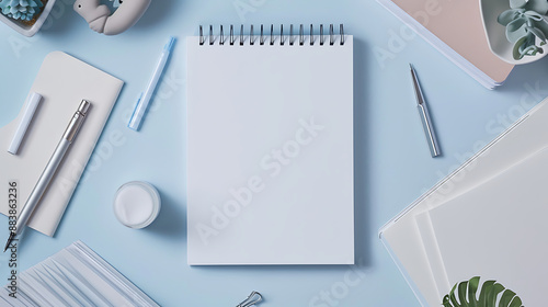 Wallpaper Mural Product markup of blank white left sided spiral notebook next to stationery items. Generative AI illustration 
 Torontodigital.ca