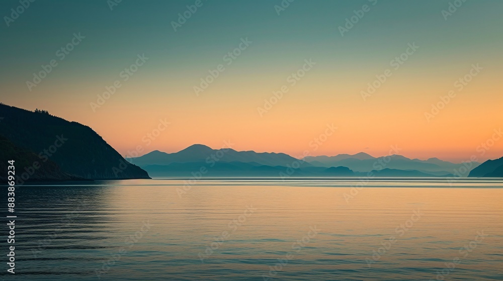 a body of water with mountains in the distance a body of water with mountains in the distance