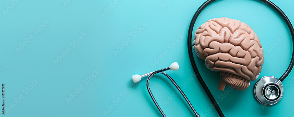 : A detailed brain model sits next to a stethoscope on a bright background. This image symbolizes neurological and psychological care, emphasizing the importance of mental health and medical atte