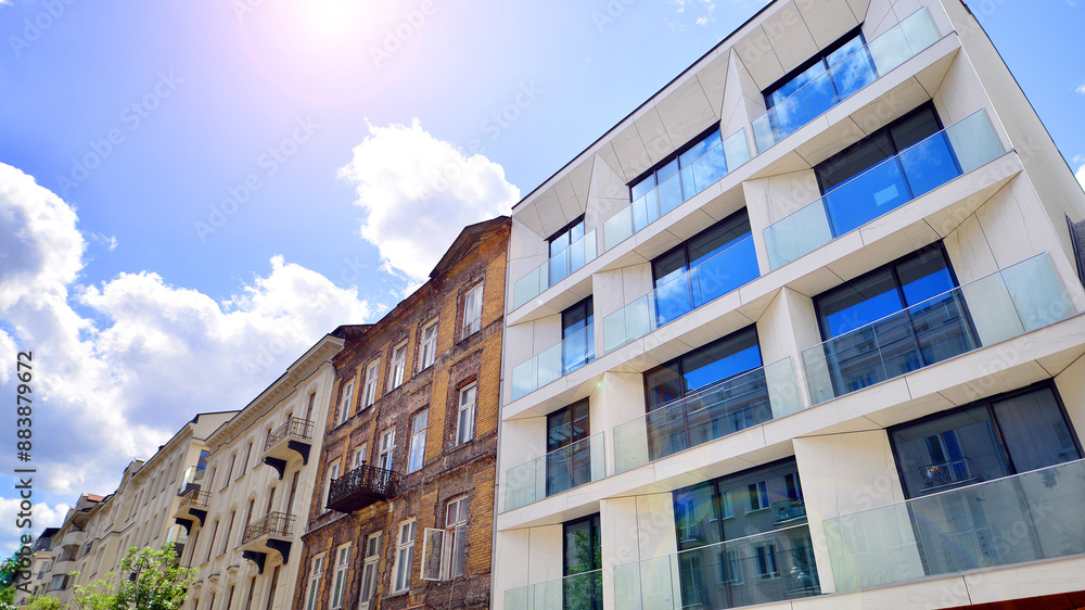 Obraz premium European residential architecture. Elements of modern architecture in apartment building. The facade of the building is made modern panels of different shades. 