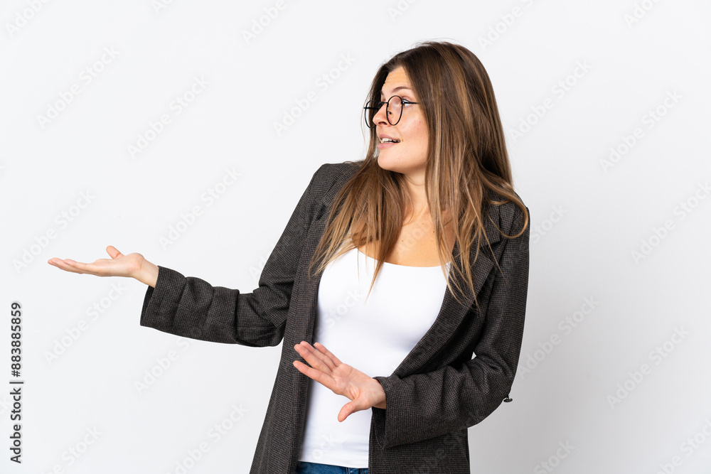 Business slovak woman isolated on white background with surprise expression while looking side Business slovak woman isolated on white background with surprise expression while looking side