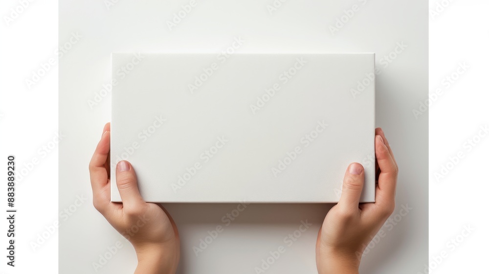 Top view hands holding an empty blank paper box against a white background. Mockup template design