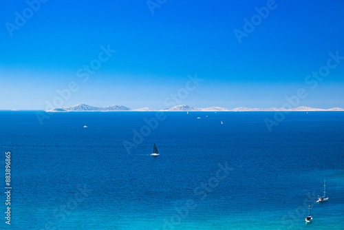 Obraz na płótnie Adriatic seascape, panoramic view from Murter island, sailing boats and yachts on blue sea, Kornati archipelago in background, Croatia w salonie