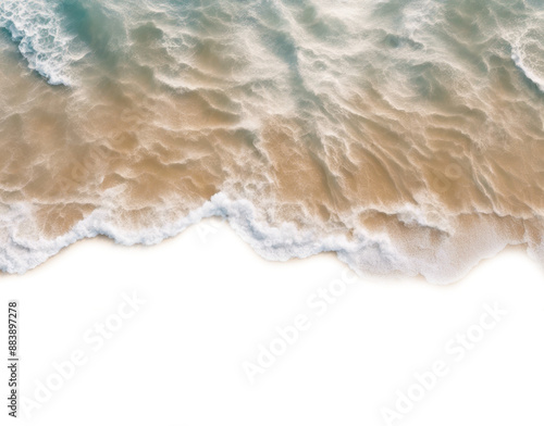 Aerial view of ocean waves gently crashing onto a sandy beach shore isolated on transparent background  photo