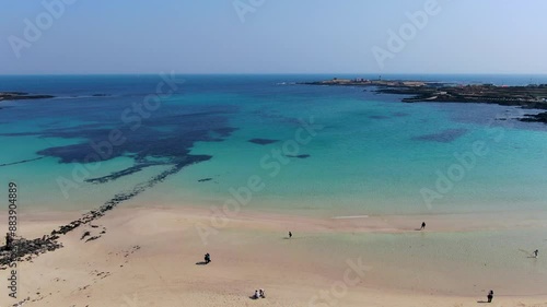 Video of Udo Island inside Jeju Island in 4K with a drone from the sky.The beautiful scenery of the sea is so clear and transparent_12