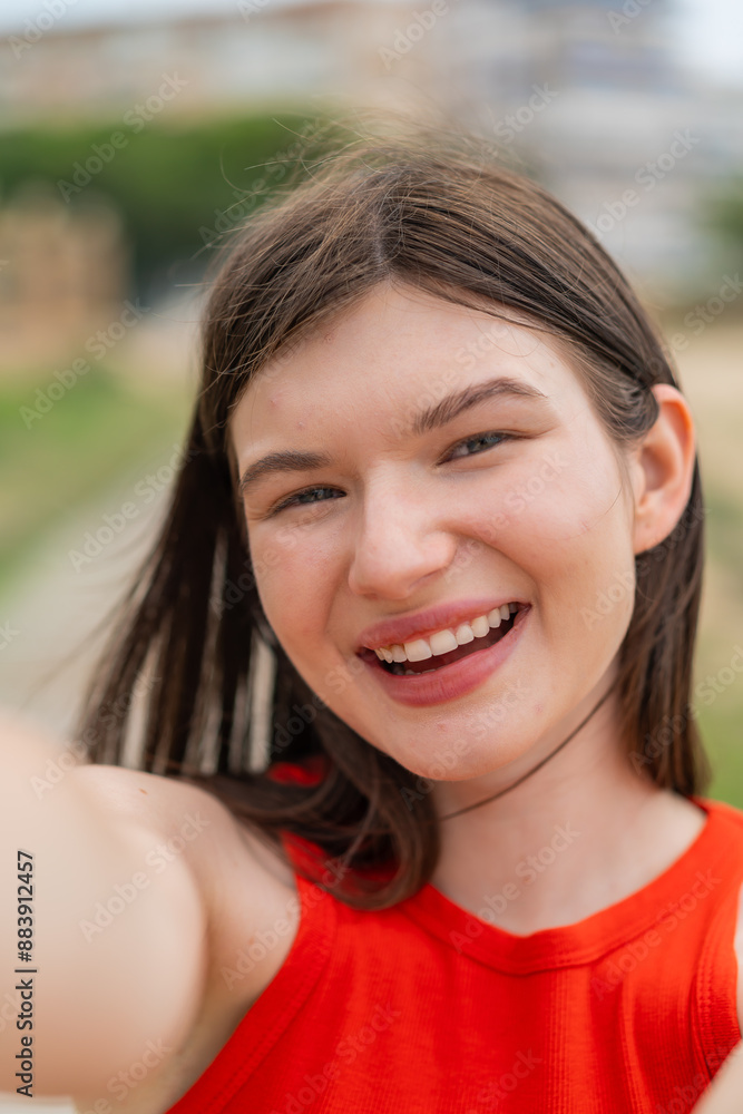 Young pretty woman at outdoors With happy expression Young pretty woman at outdoors With happy expression