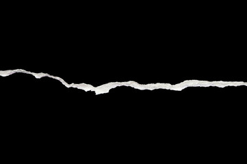 Ripped torn paper edges isolated on black background