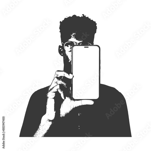 Silhouette of a man holding a smartphone in front of his face