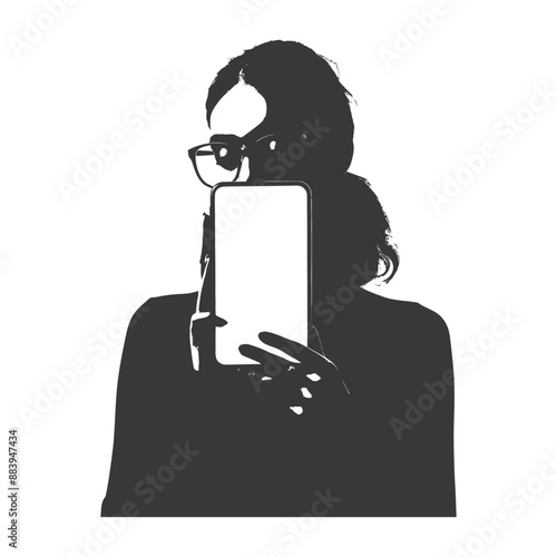 Silhouette of a woman wearing glasses holding a smartphone
