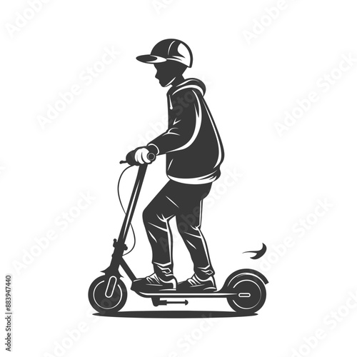 Boy having fun riding his kick scooter