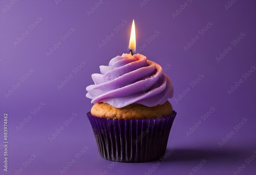 Purple Birthday Cupcake With a Lit Candle on Purple Background Purple Birthday Cupcake With a Lit Candle on Purple Background