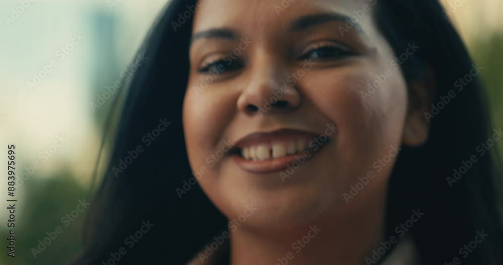 Young woman smiling with an ‘I Voted’ stickers and pin Young woman smiling with an ‘I Voted’ stickers and pin