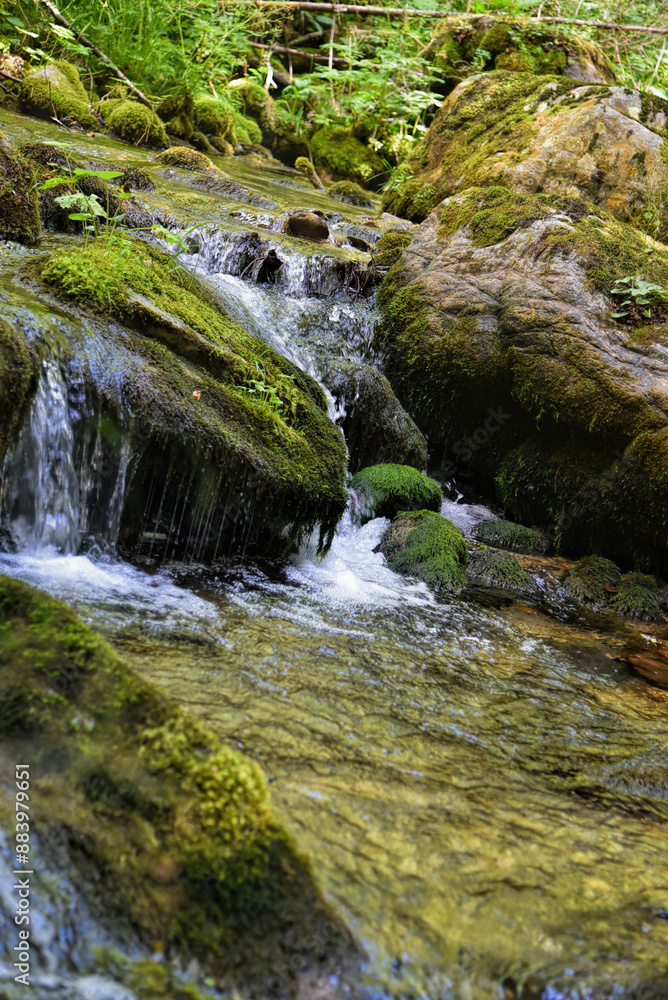 Photography of rocky river in wild with amazing green and moss details on rocks. Photography of rocky river in wild with amazing green and moss details on rocks.
