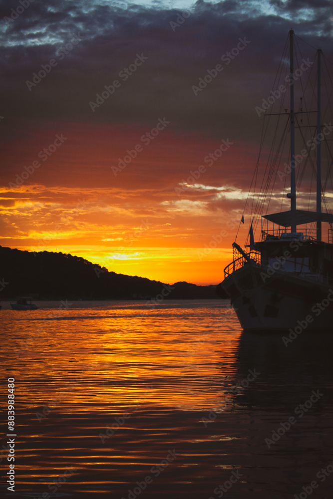 Fototapeta premium sunset near a old ship