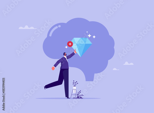 Concept of brilliant mind, building Self-Confidence, Personality Development, businessman adding diamond inside big brain