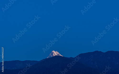 sunrise over the mountains in Lamjung Nepal. photo