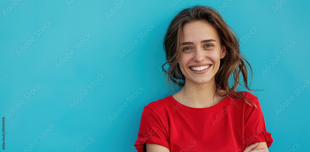 Smiling Woman Against Blue Background on a Sunny Day Smiling Woman Against Blue Background on a Sunny Day