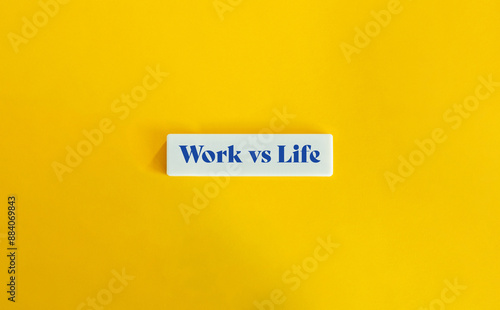 Work vs Life. Work-Life Balance. Blue Text on Block Letter Tile on Yellow Background. Minimal Aesthetic. photo